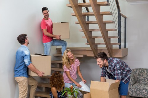 Movers helping with a residential move in Friern Barnet