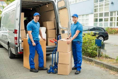 Packed household items prepared for transport by moving truck service