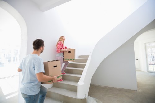 Movers handling stairs and access challenges in a Friern Barnet flat move