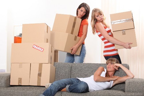 Local removals team handling furniture in Friern Barnet